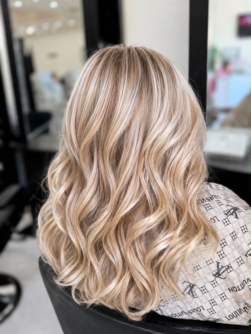 Blonde balayage with soft waves