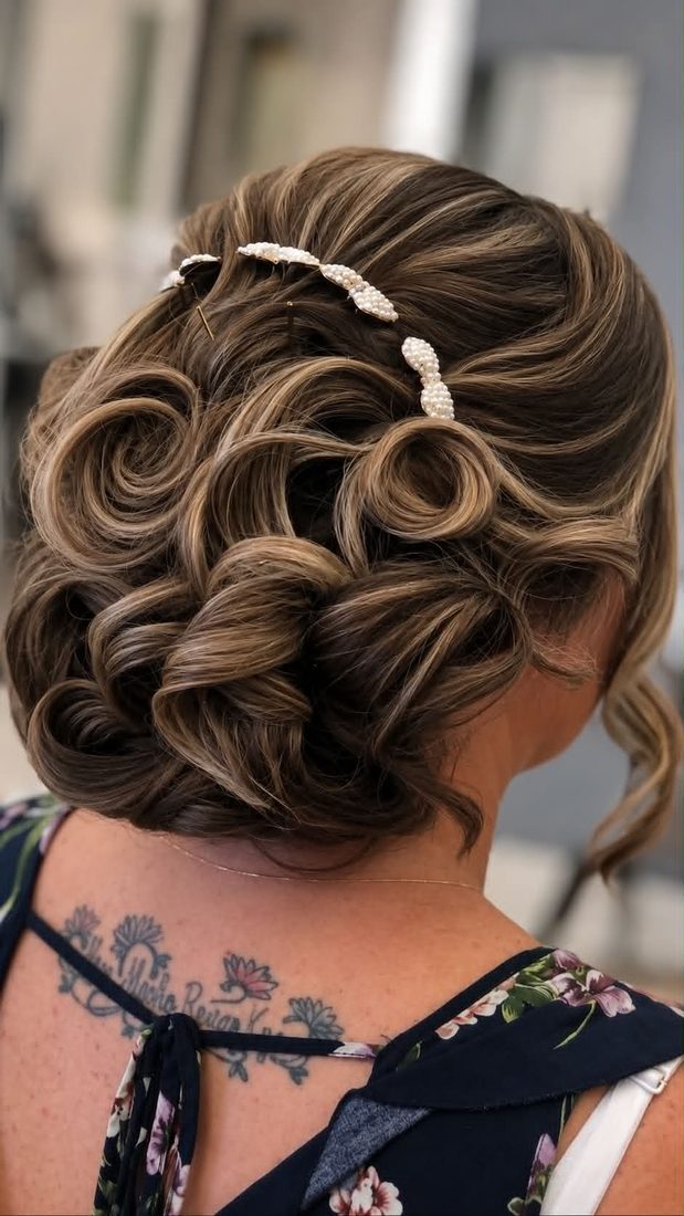 Vintage-inspired bridal updo with pearls
